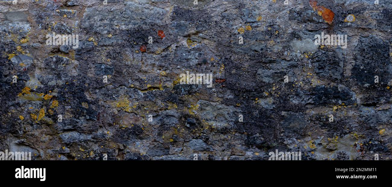 Panoramic natural stone wall pattern for background Stock Photo - Alamy