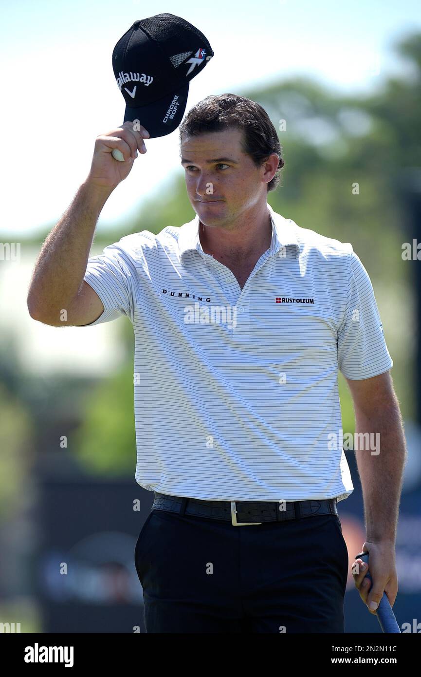 Sam Saunders, grandson of Arnold Palmer, acknowledges the crowd after  making a birdie putt on the 17th green during the third round of the Arnold  Palmer Invitational golf tournament in Orlando, Fla.,
