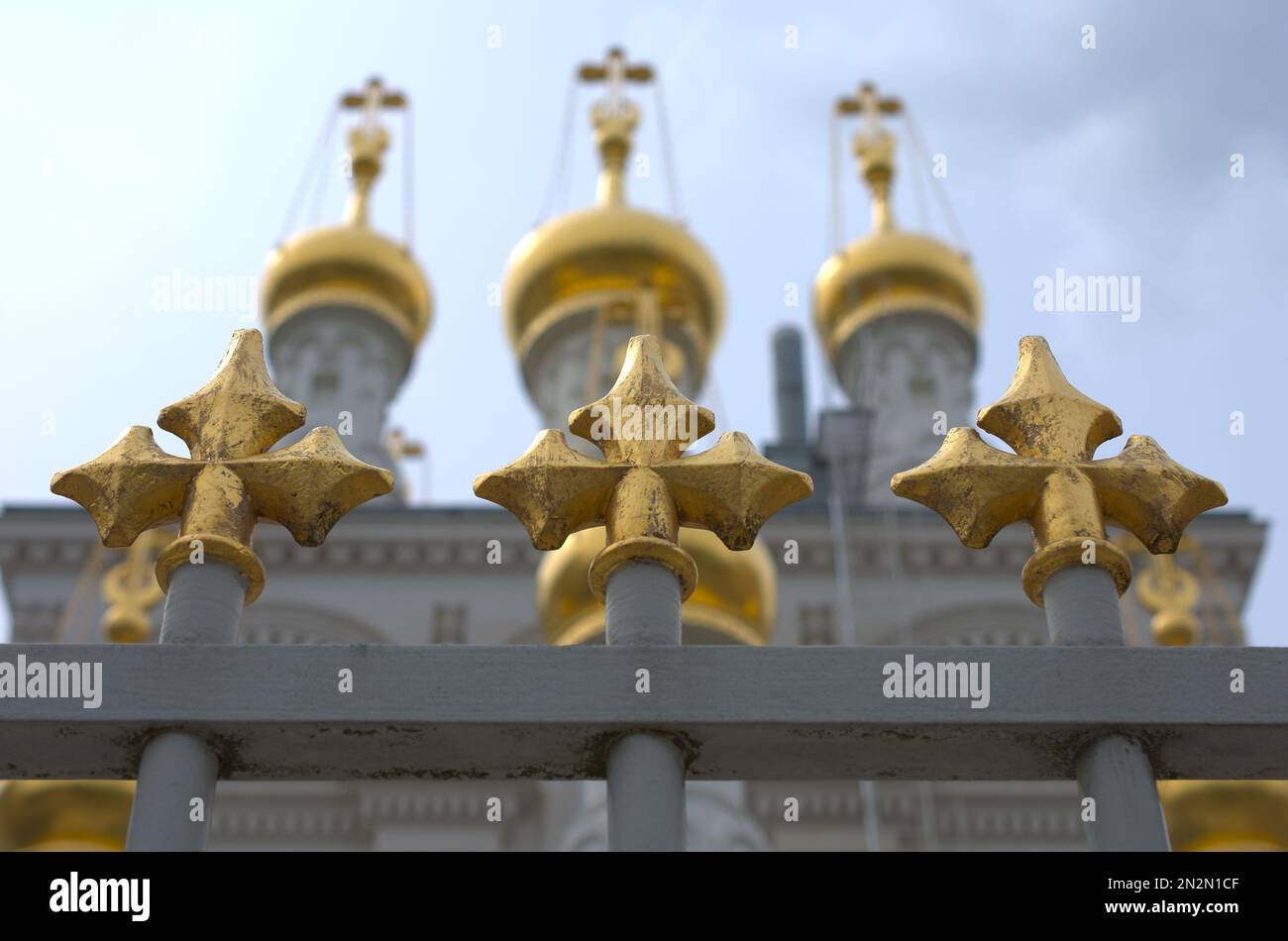 Russian orthodox church, pickets semi-aligned with the domes. Geneva, Switzerland Stock Photo