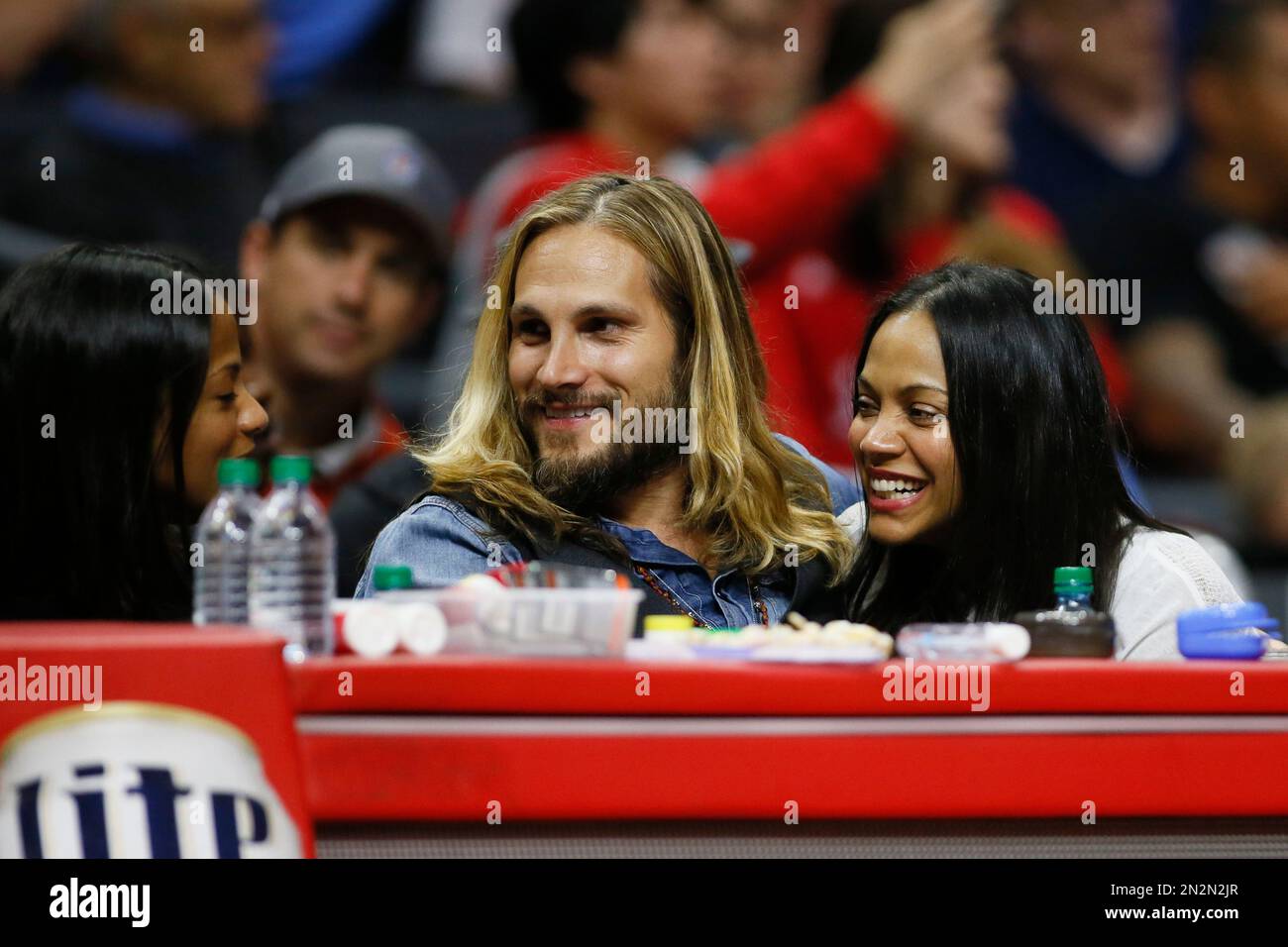 Actress Zoe Saldana, right, her husband Marco Perego and sister Cisely ...