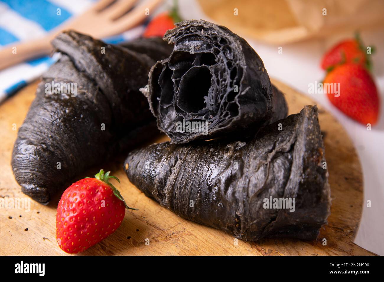 Croissant made with activated charcoal. Vegan breakfast Stock Photo Alamy