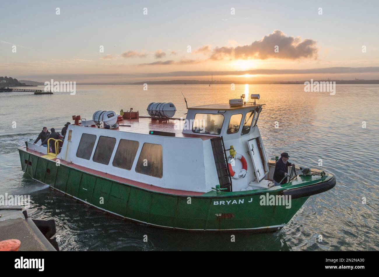 Cobh, Cork, Ireland. 07th February, 2023. Ferry boat 'Bryan J' about to depart the pier in Cobh, Co. Cork at sunrise with Naval Service personnel as it transports them to the Haulbowline Navy Base in Cork Harbour.  - Picture;  Credit; David Creedon / Alamy Live News Stock Photo