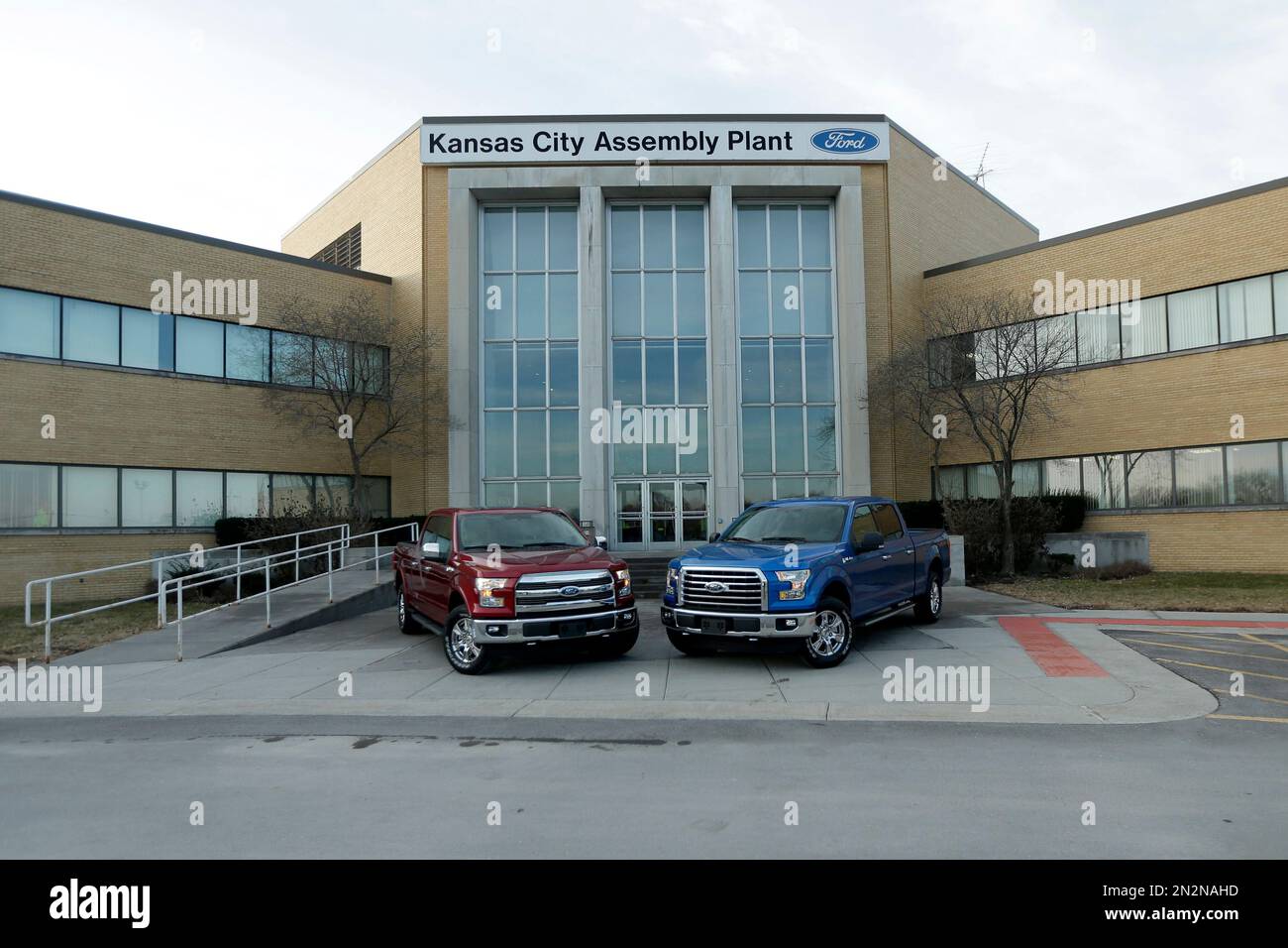 New aluminumalloy body Ford F150 trucks are parked in front of the company's Kansas City