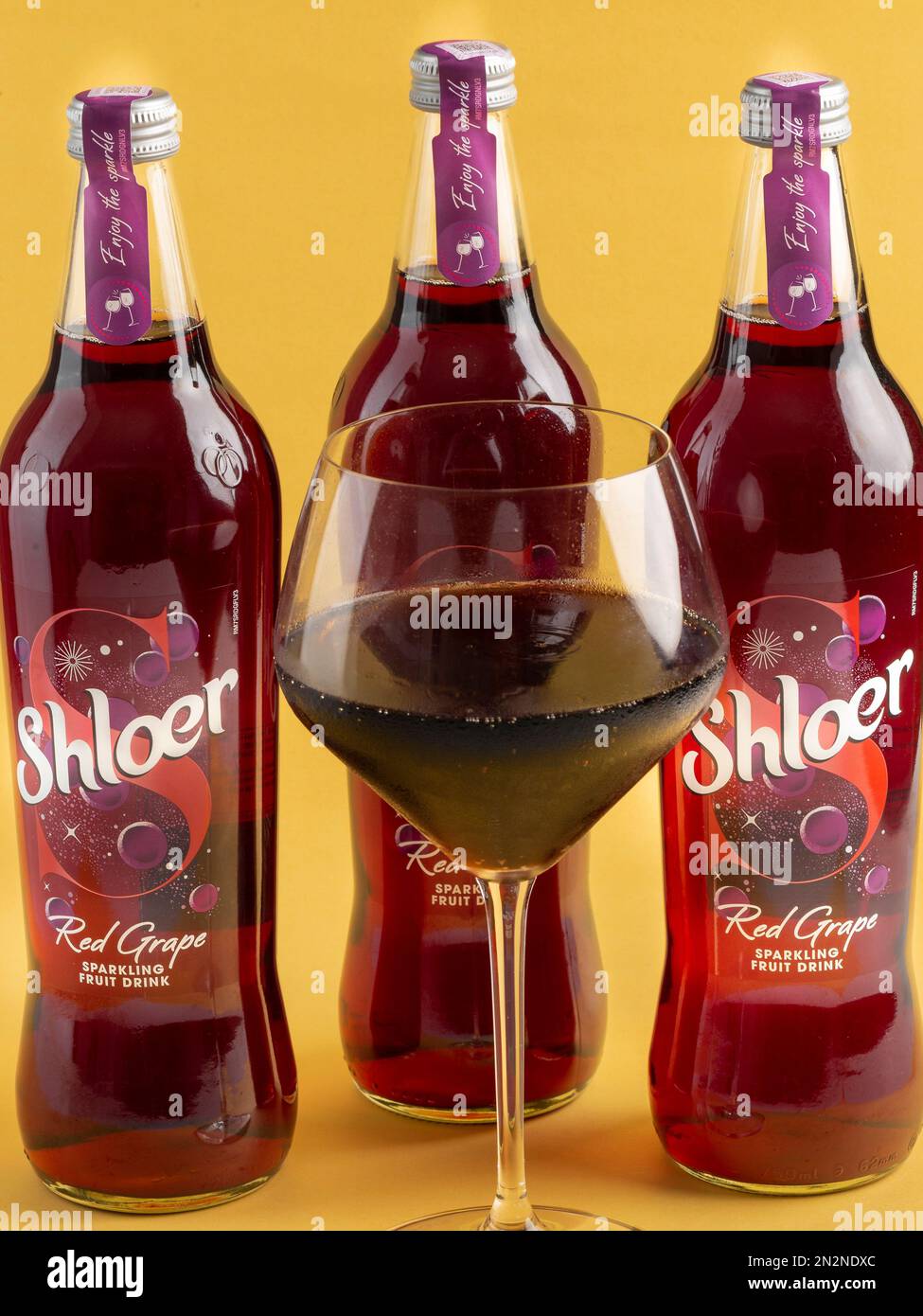 three bottles with glass Stock Photo