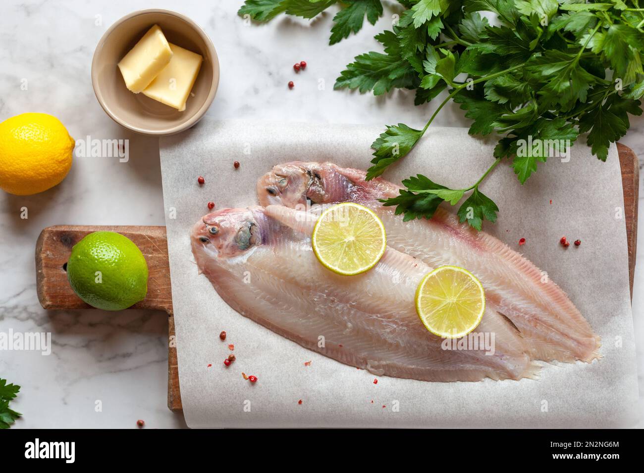 raw sole flatfish ready to be cooked meuniere style, french traditional recipe, top view Stock Photo