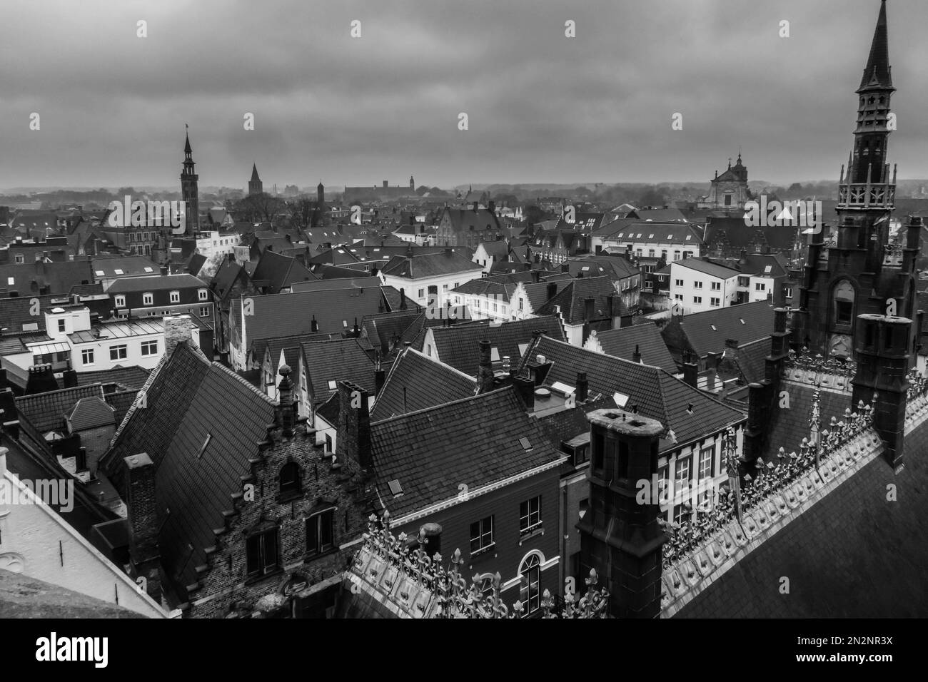 Sightseeing over the red clay tiled roofs of Bruges Belgium Europe. November 2022 Stock Photo