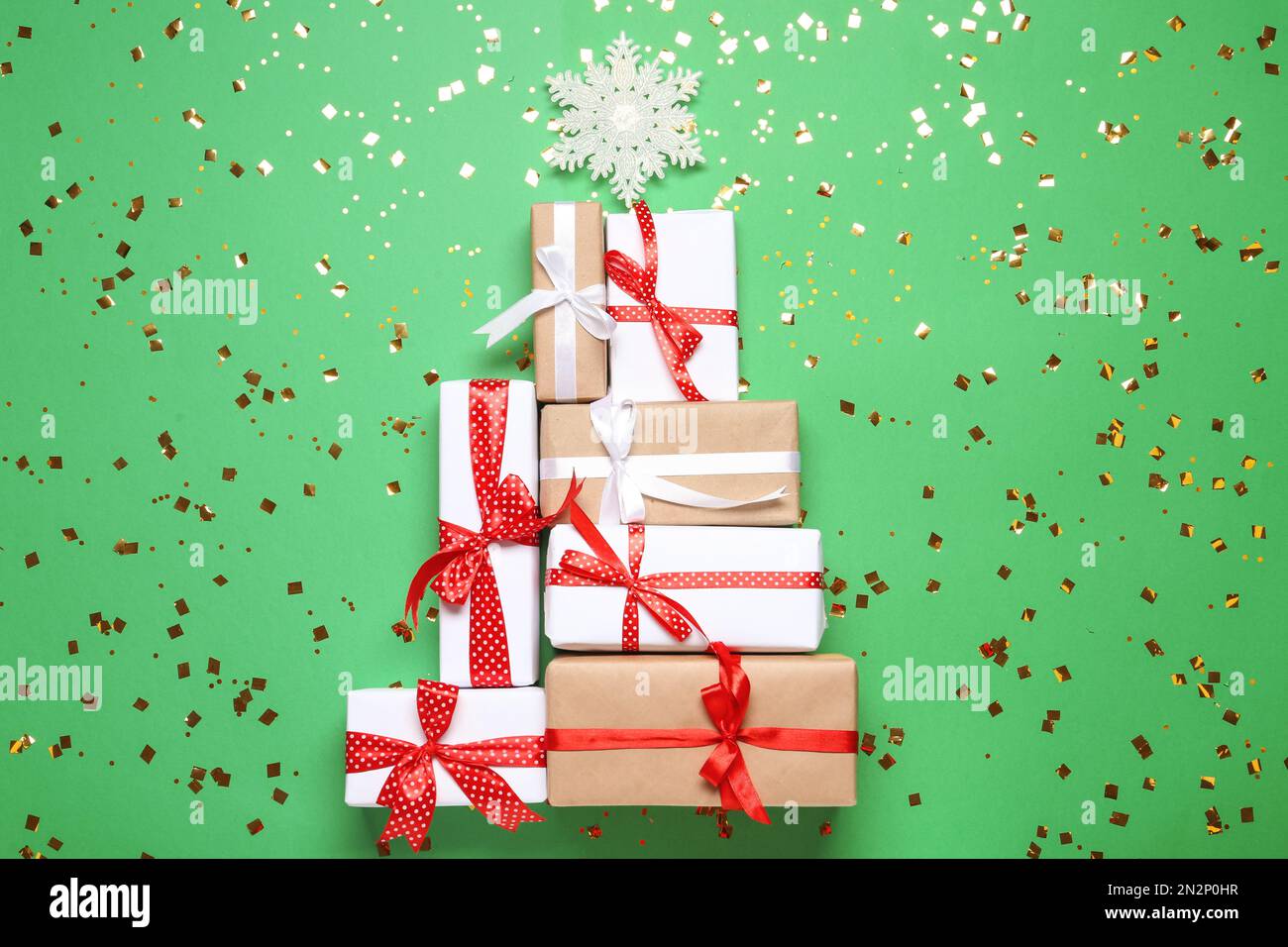 Christmas tree made with different gift boxes on green background, flat ...