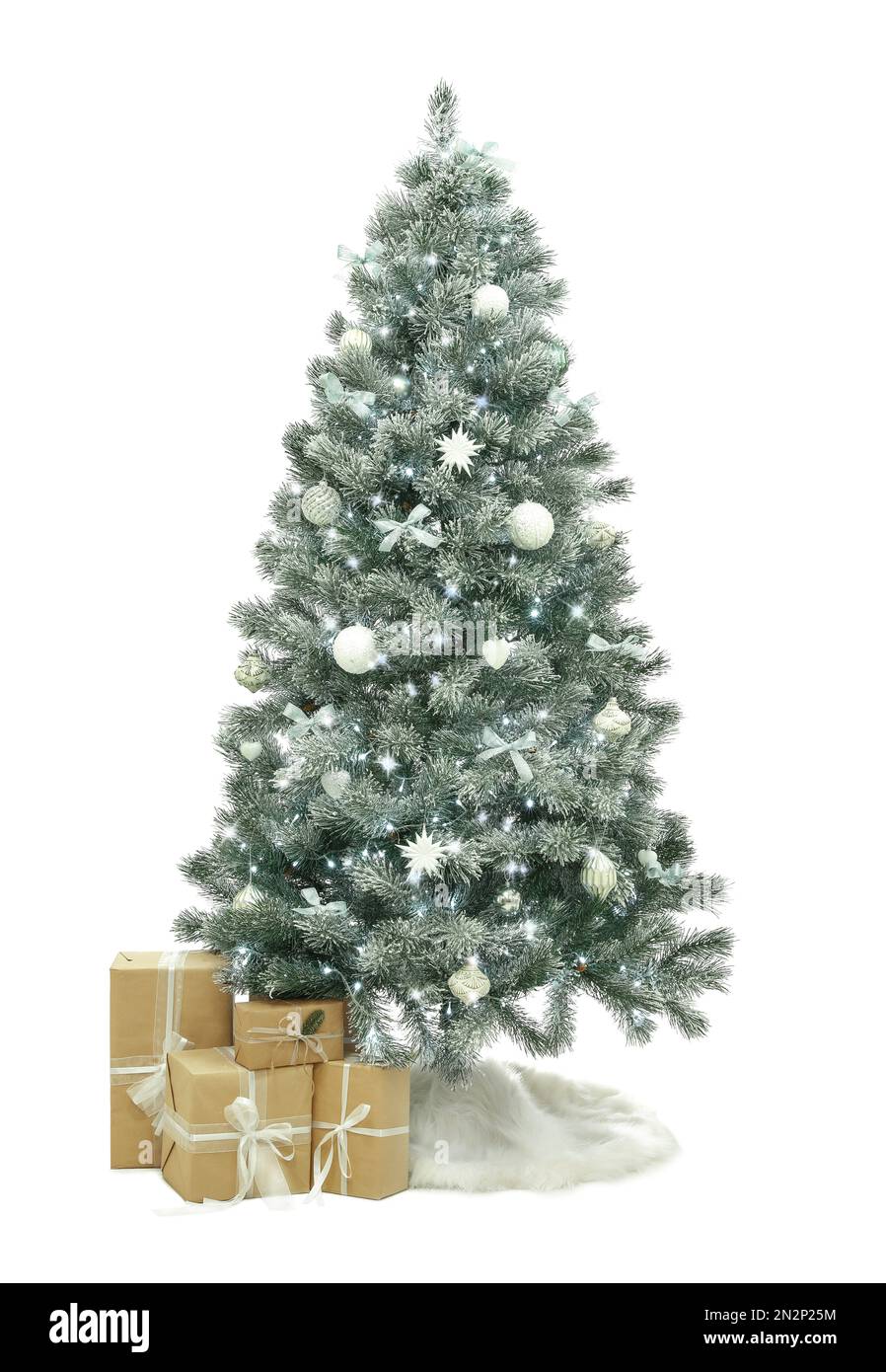 Decorated Christmas tree with faux fur skirt and gift boxes on white ...