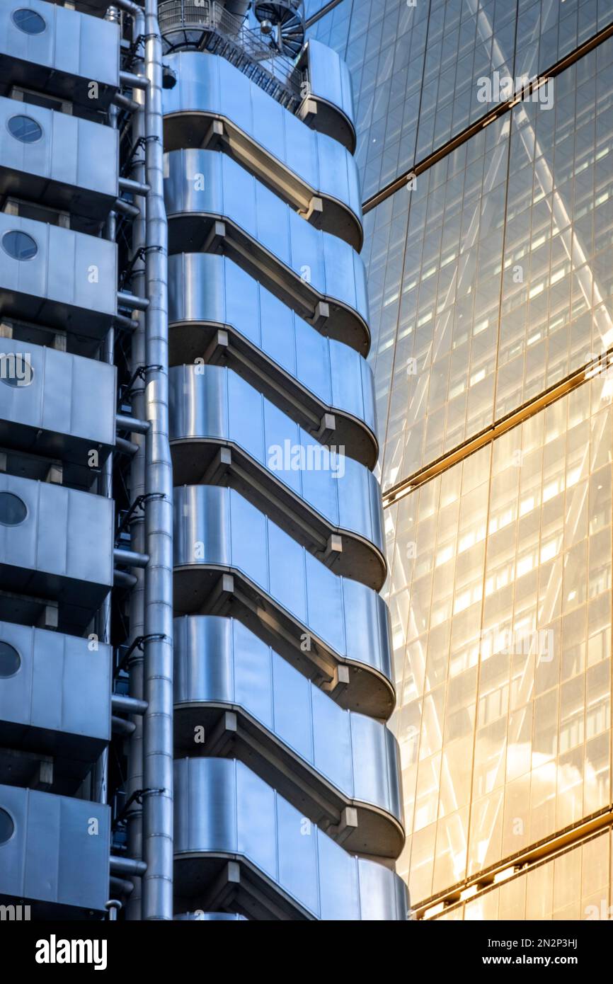City of London Financial District, detail: Lloyd's of London building (foreground, Richard Rogers, 1984) & 122 Leadenhall St. (Richard Rogers, 2014) Stock Photo