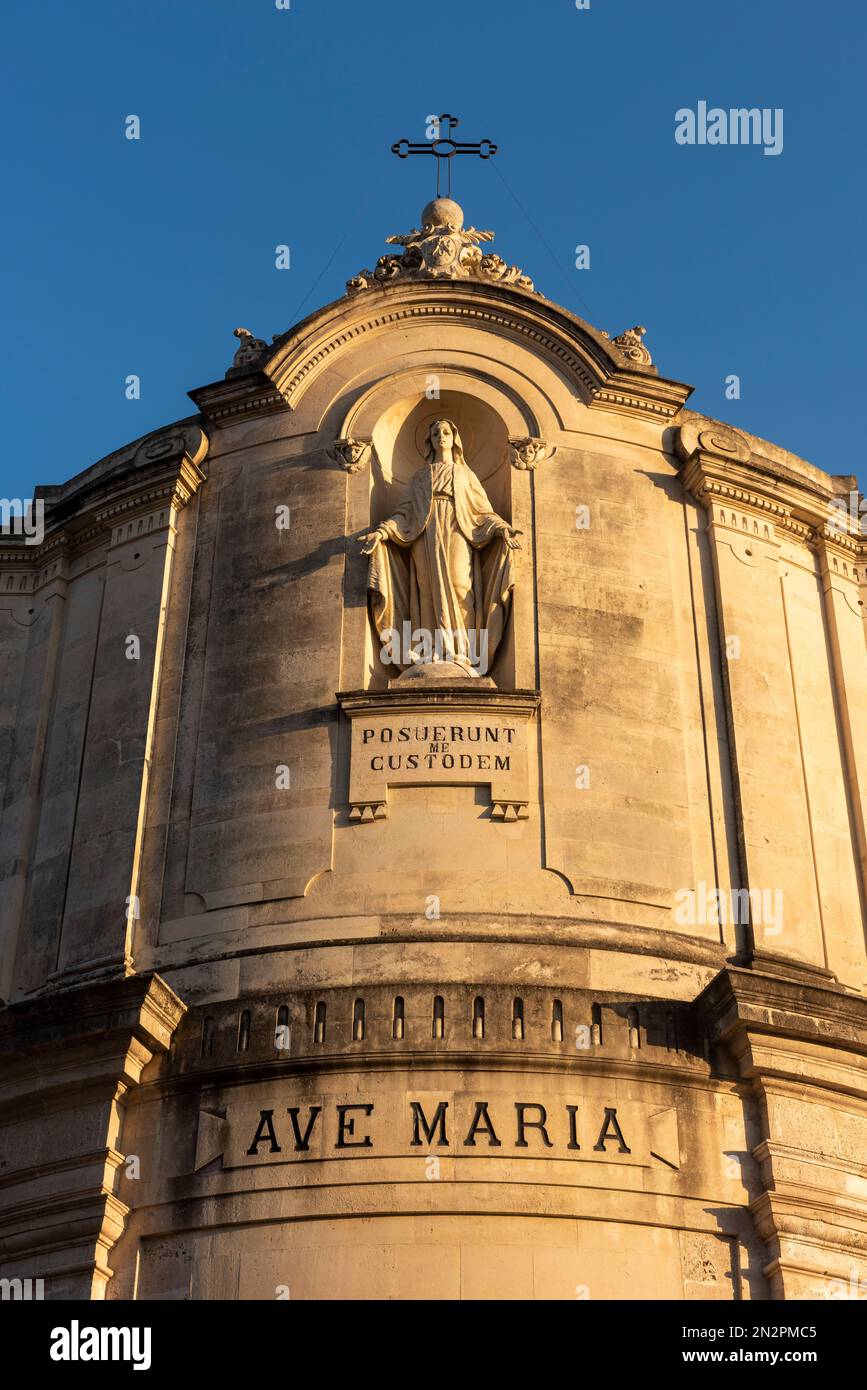 The Church of the Immaculate Conception, Catania, Sicily. The motto beneath the statue of the Madonna translates as 'They put me here as guardian' Stock Photo