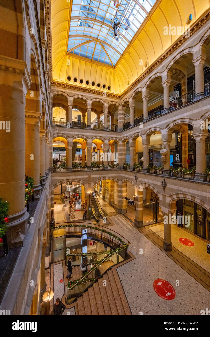 The interior of Magna Plaza shopping arcade in Amsterdam Netherlands