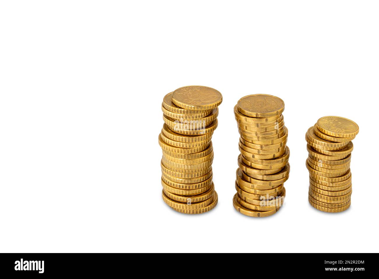 Stacks of gold colored coins, euro cents isolated on white with clipping path and copy space Stock Photo