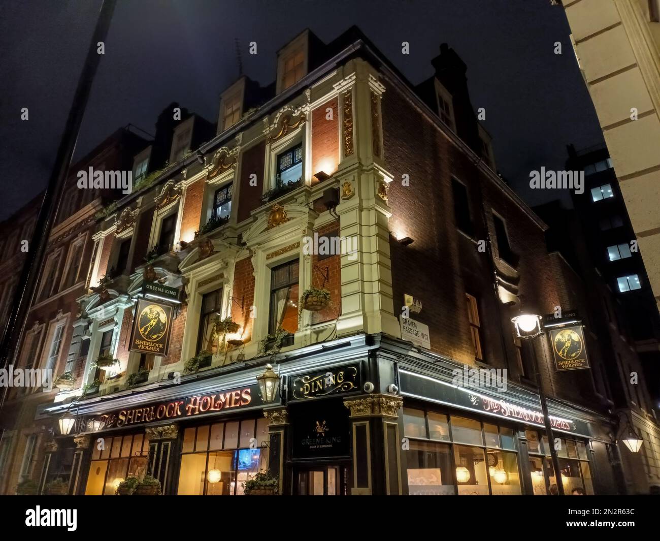 The Sherlock Holmes pub at night in Westminster, London Stock Photo