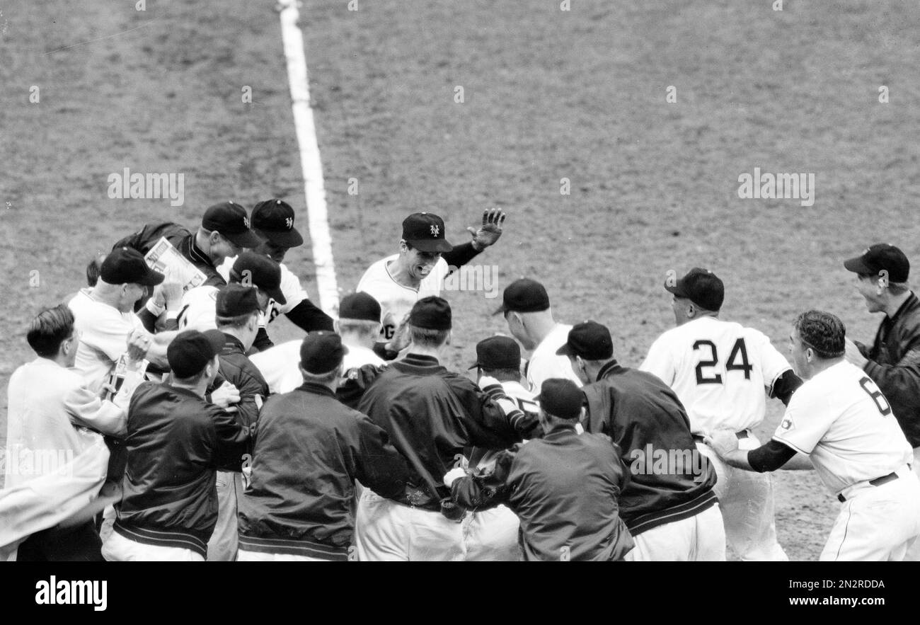 The New York Giants surround third baseman Bobby Thomson for his game