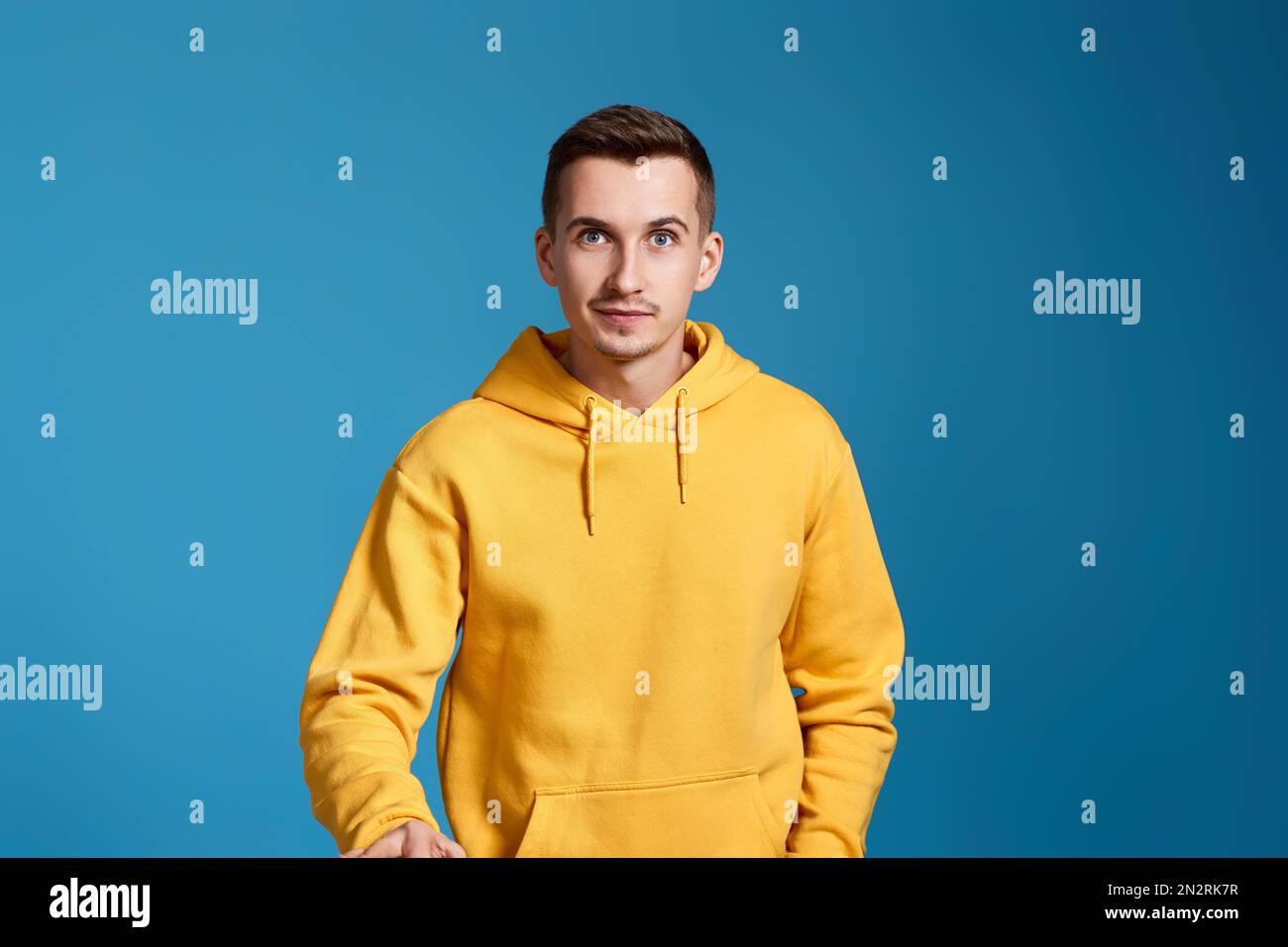 Happy smart casual guy blue hi-res stock photography and images - Alamy