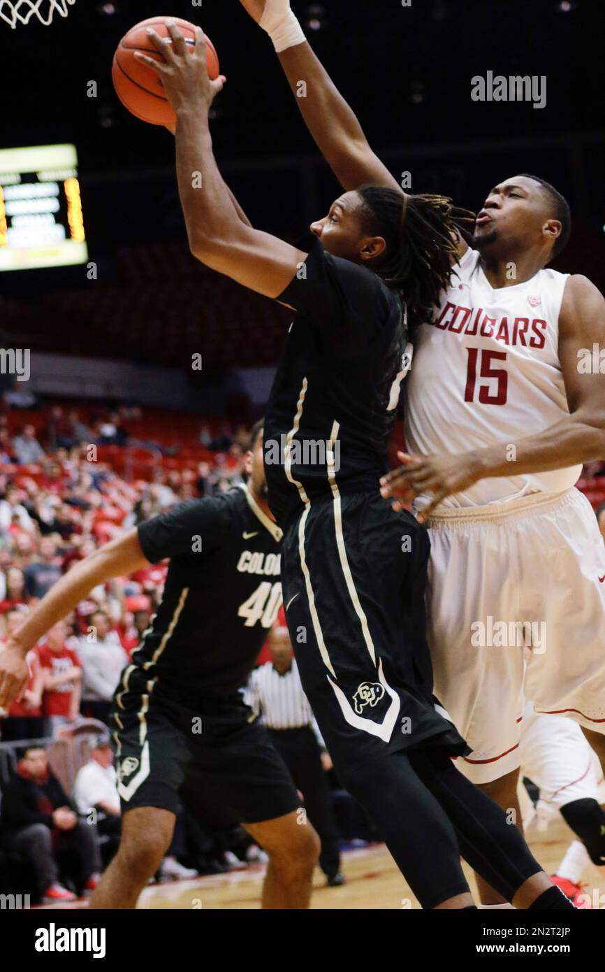Colorado guard Xavier Johnson (2) grabs a rebound in front of