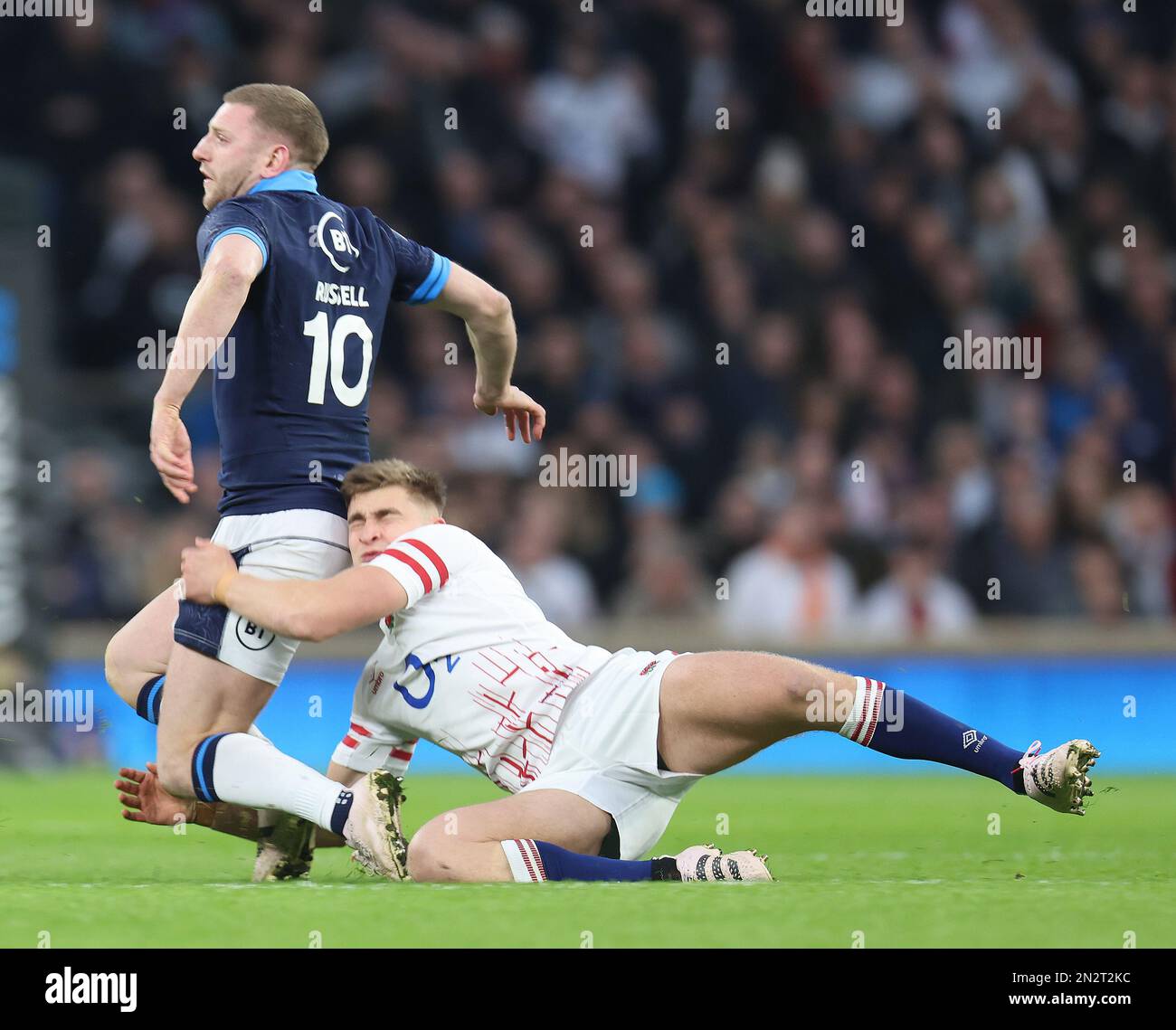 England's Alex Dombrandt tackles Finn Russell of Scotland during the ...