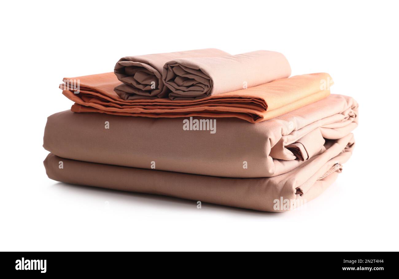Stack of clean bed sheets isolated on white Stock Photo - Alamy
