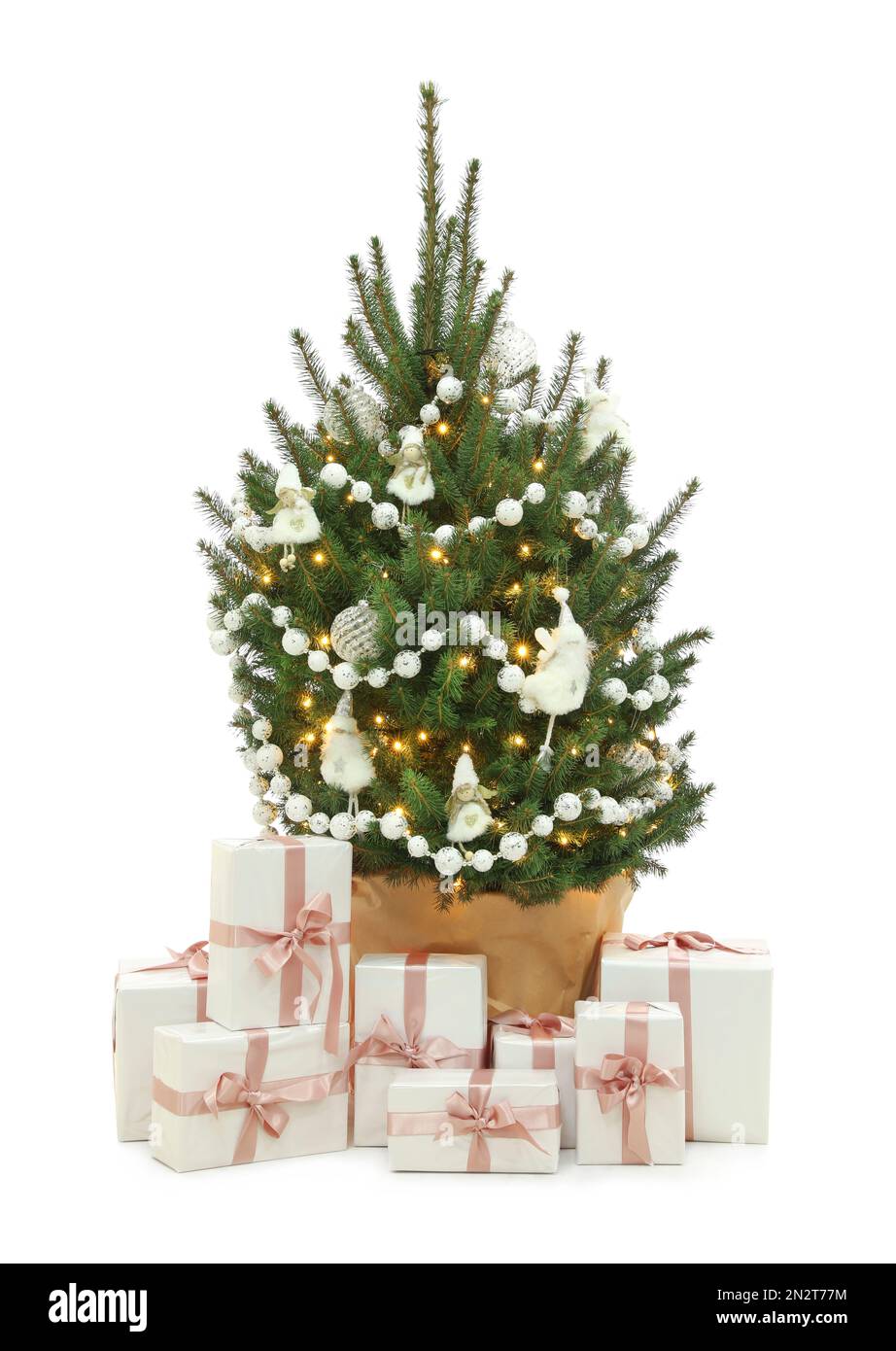 Beautiful decorated Christmas tree and gift boxes on white background ...