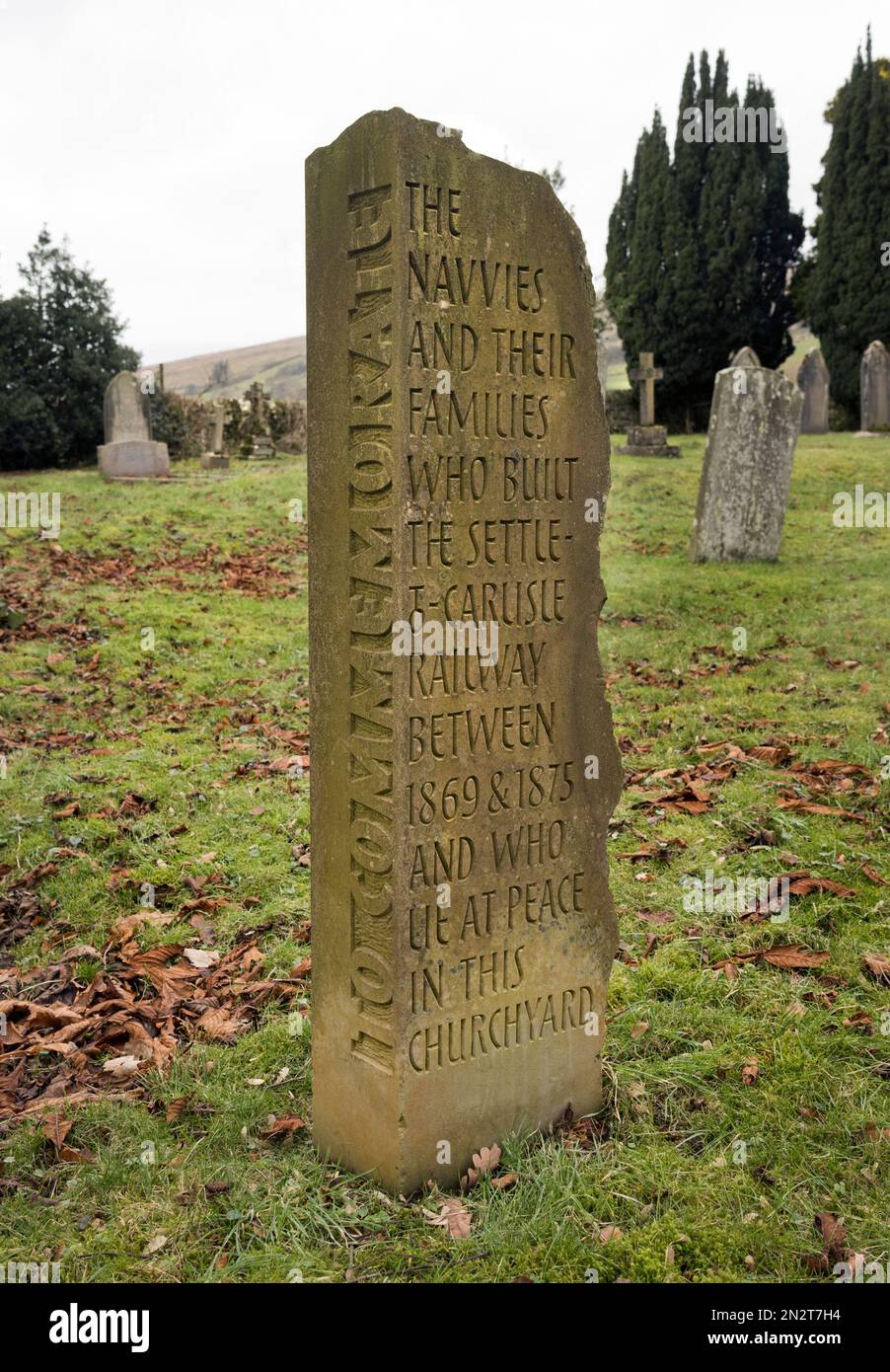 Memorial to the railway navvies and their families who died during the building of the Settle-Carlisle line, Cowgill Churchyard, Dentdale, Cumbria. Stock Photo