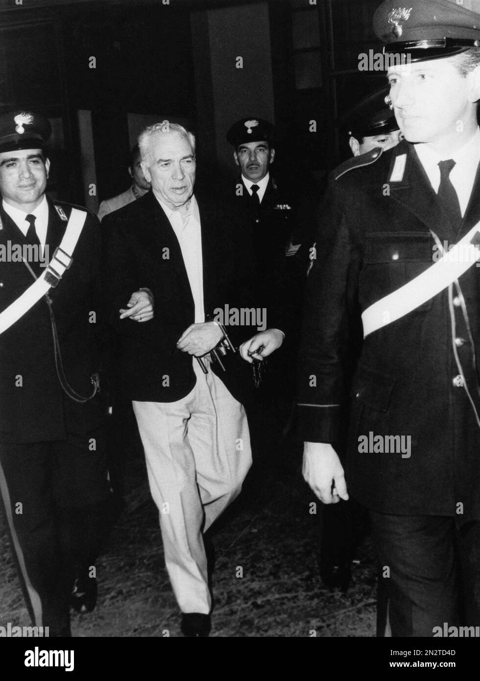 Handcuffed Joe Adonis, 69 arrives at a Milan, Italy court, June 3, 1971 ...