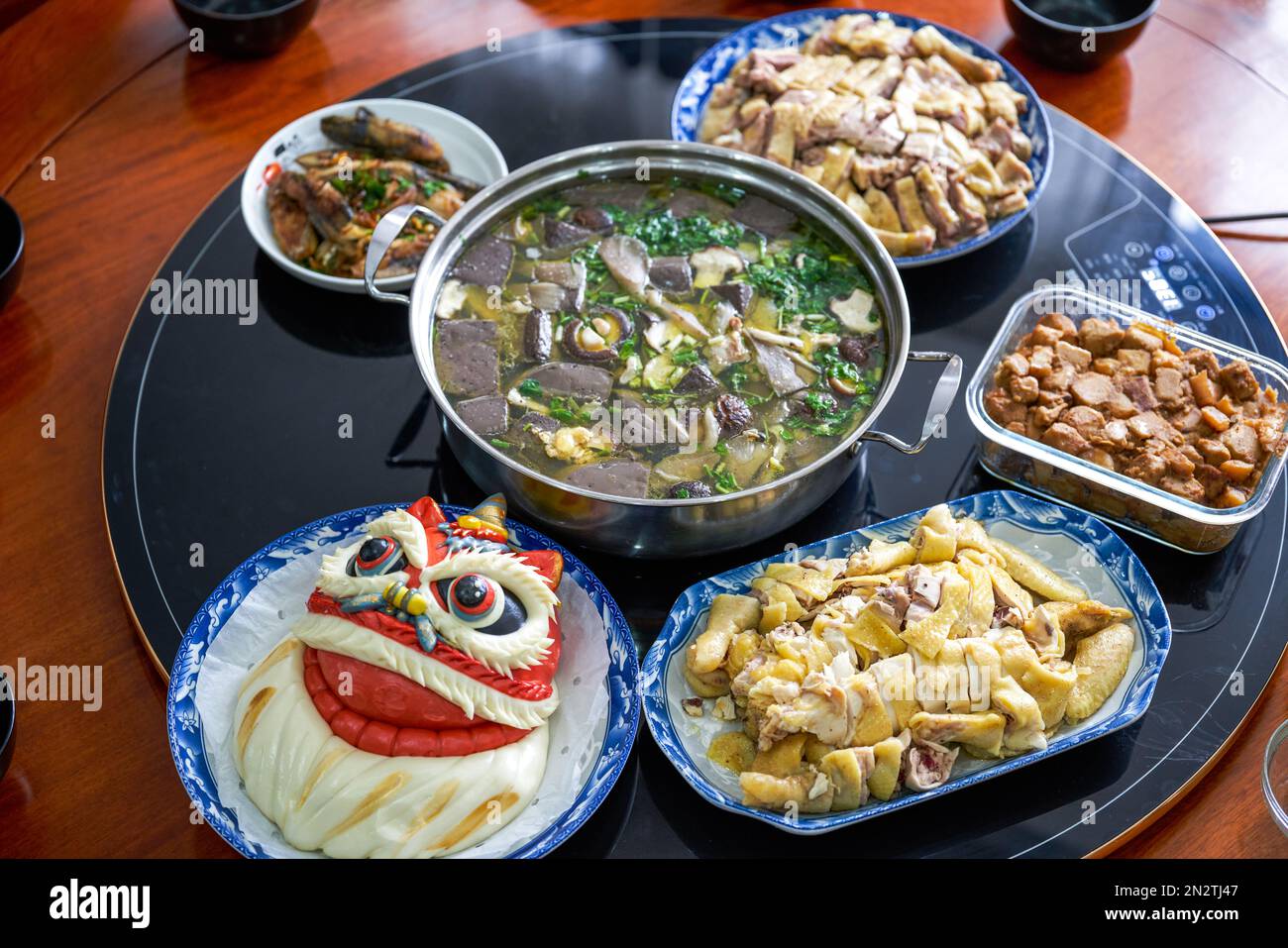 A table of New Year's Eve dinner for Chinese New Year reunion Stock Photo