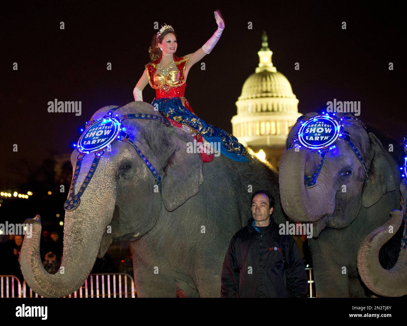 FILE In this March 19, 2013 file photo, a performer waves as