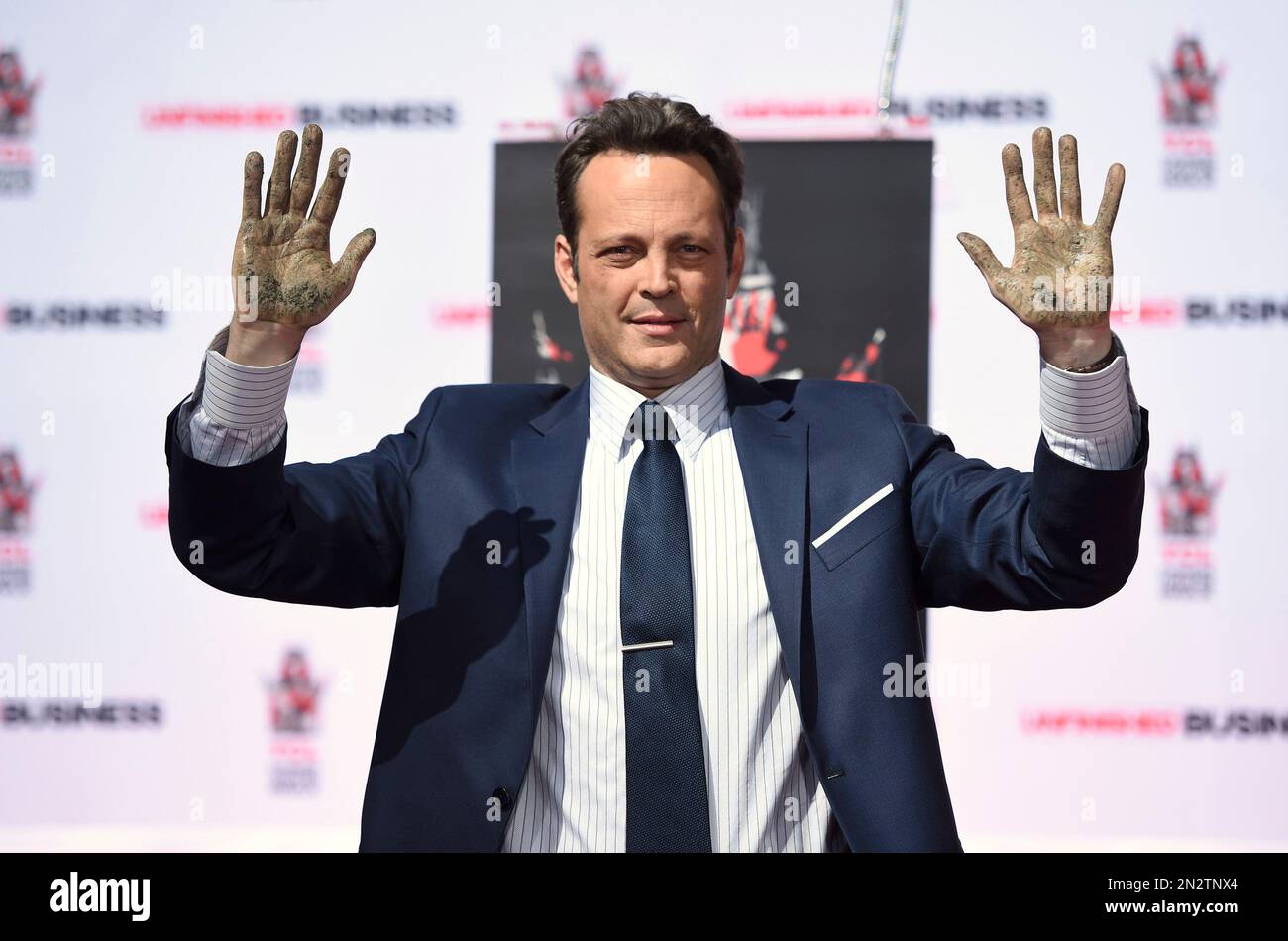 Vince Vaughn shows his hands during his handprint and footprint(00)