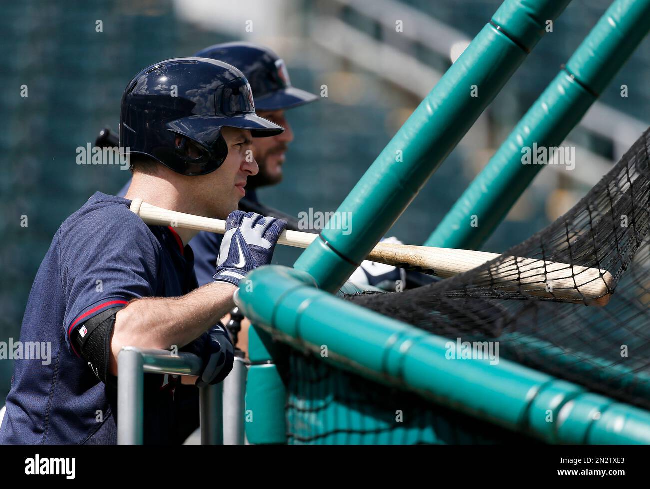 Minnesota Twins first baseman Joe Mauer leans against the batting cage