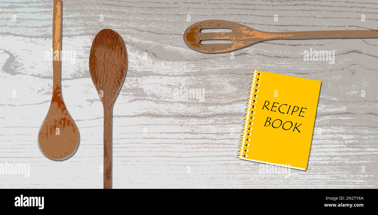 Utensils and vintage cooking book on wooden table hires stock