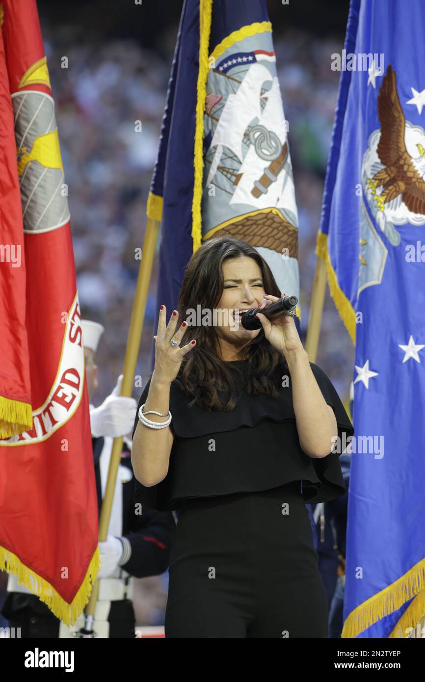 Idina Menzel sings the national anthem before the NFL Super Bowl XLIX