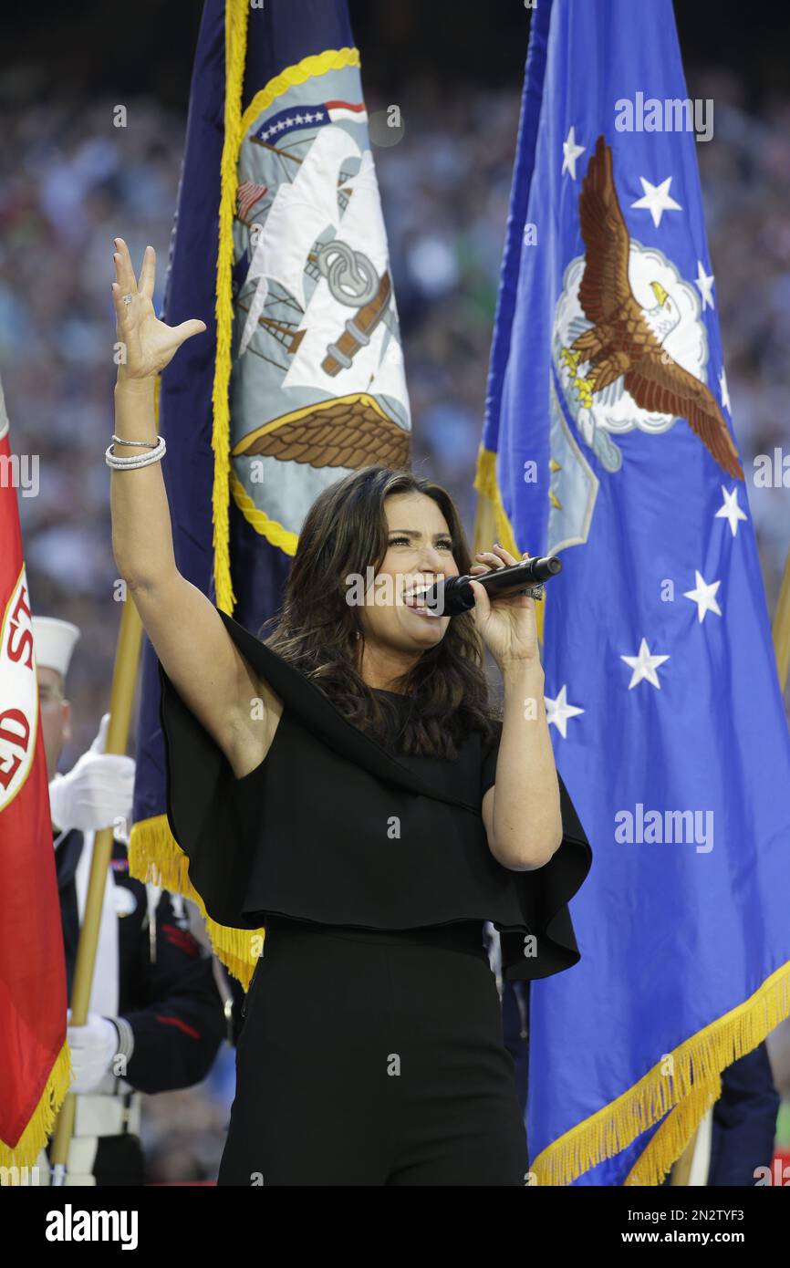 Idina Menzel sings the national anthem before the NFL Super Bowl XLIX