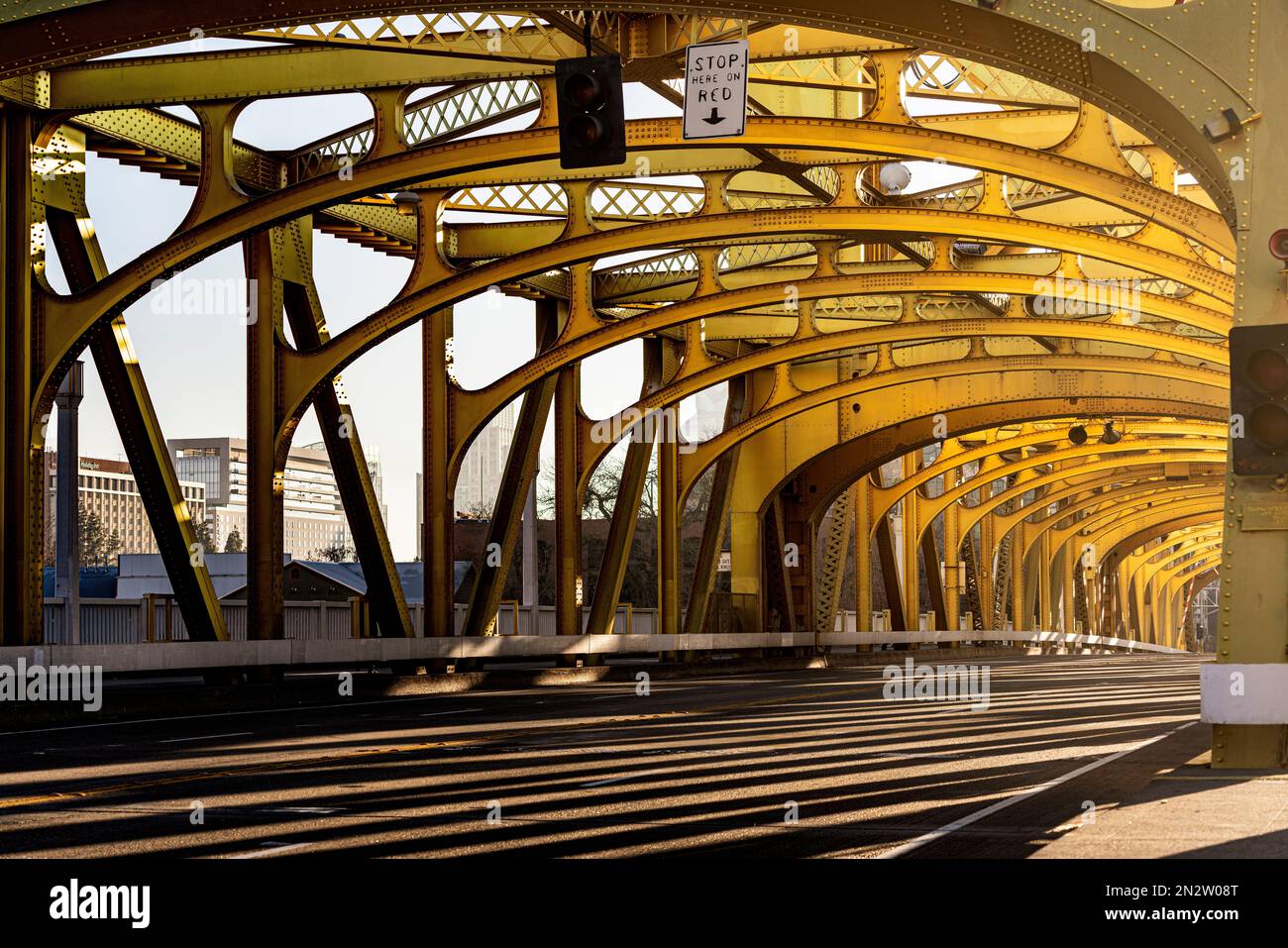 The yellow steel Sacramento's Tower Bridge at sunrise Stock Photo - Alamy