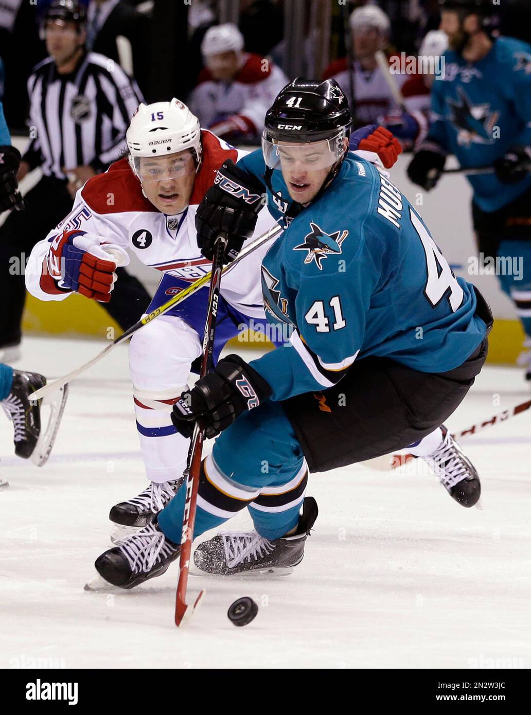 san-jose-sharks-mirco-mueller-41-controls-the-puck-next-to-montreal-canadiens-pierre-alexandre-parenteau-during-the-second-period-of-an-nhl-hockey-game-monday-march-2-2015-in-san-jose-calif-ap-photomarcio-jose-sanchez-2N2W3JC.jpg