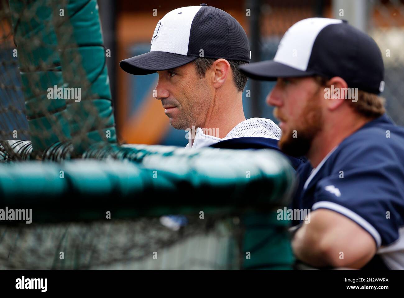 Detroit Tigers manager Bad Ausmus, center, stands behind the batting