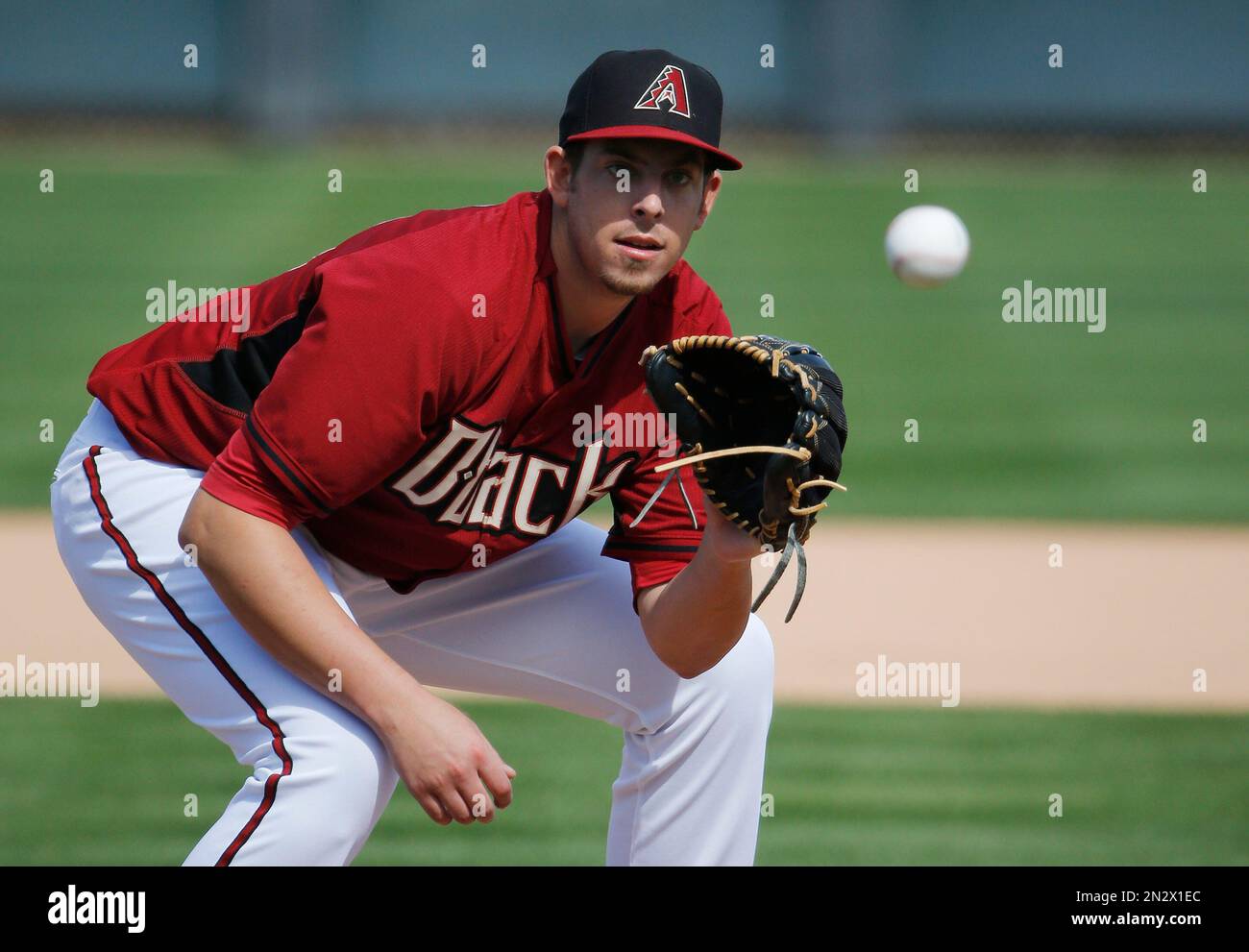 Arizona Diamondbacks pitcher Aaron Blair gets ready to catch a grounder during spring training