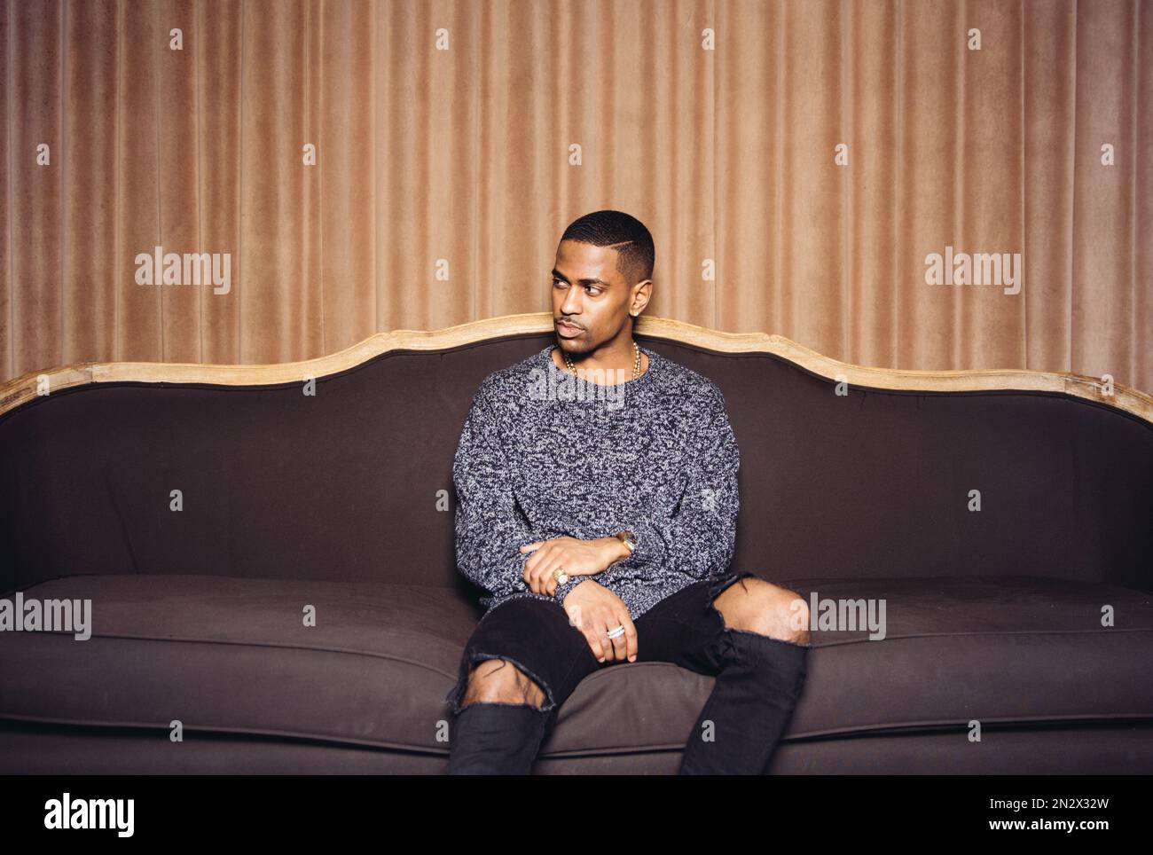 FILE - In this Feb. 19, 2015 file photo, singer Big Sean poses for a portrait at The Redbury Hotel in Los Angeles to promote his latest album, "Dark Sky Paradise." (Photo by Casey Curry/Invision/AP, File) Stock Photo