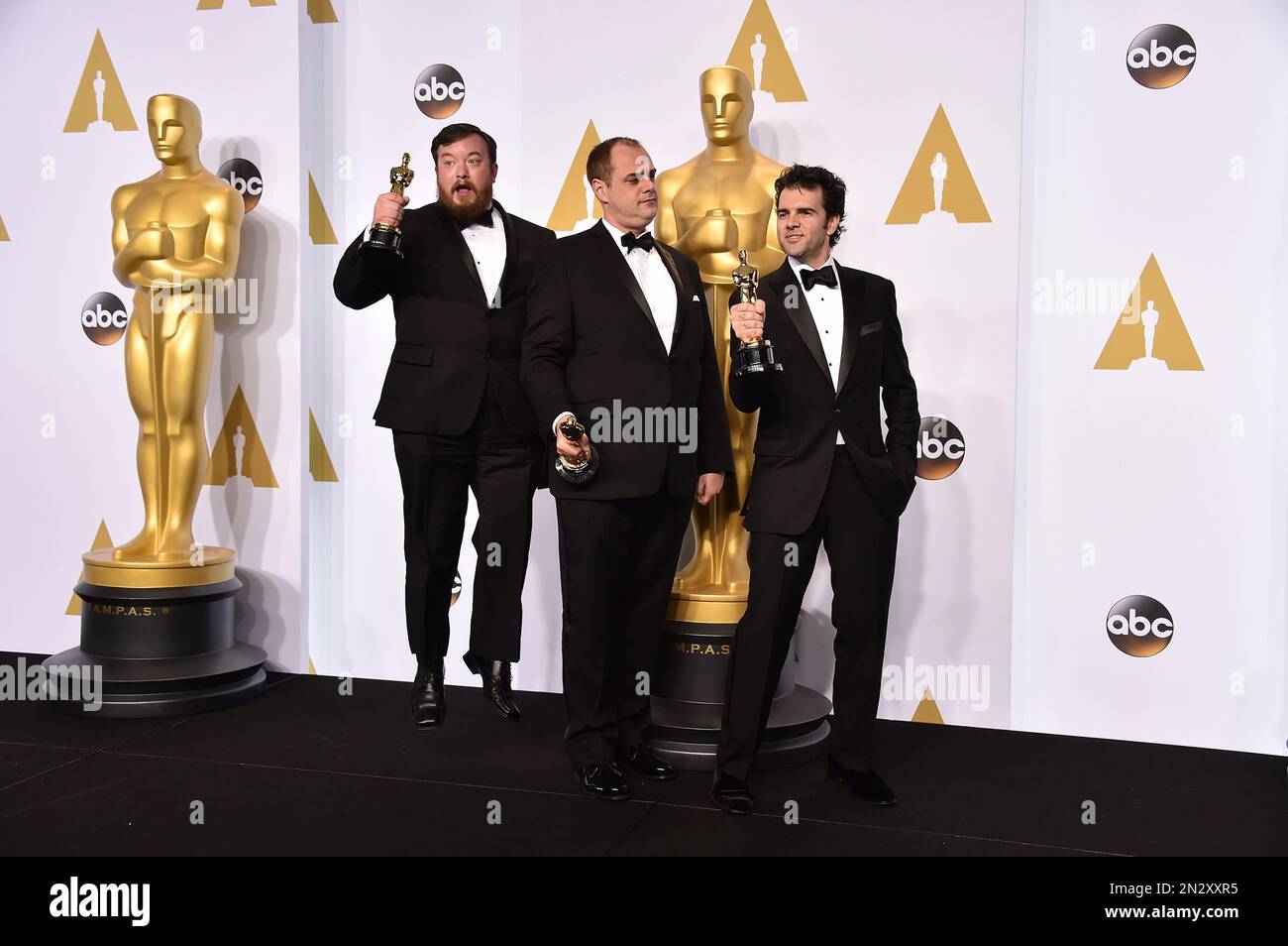 Thomas Curley, and from left, Ben Wilkins and Craig Mann pose in the