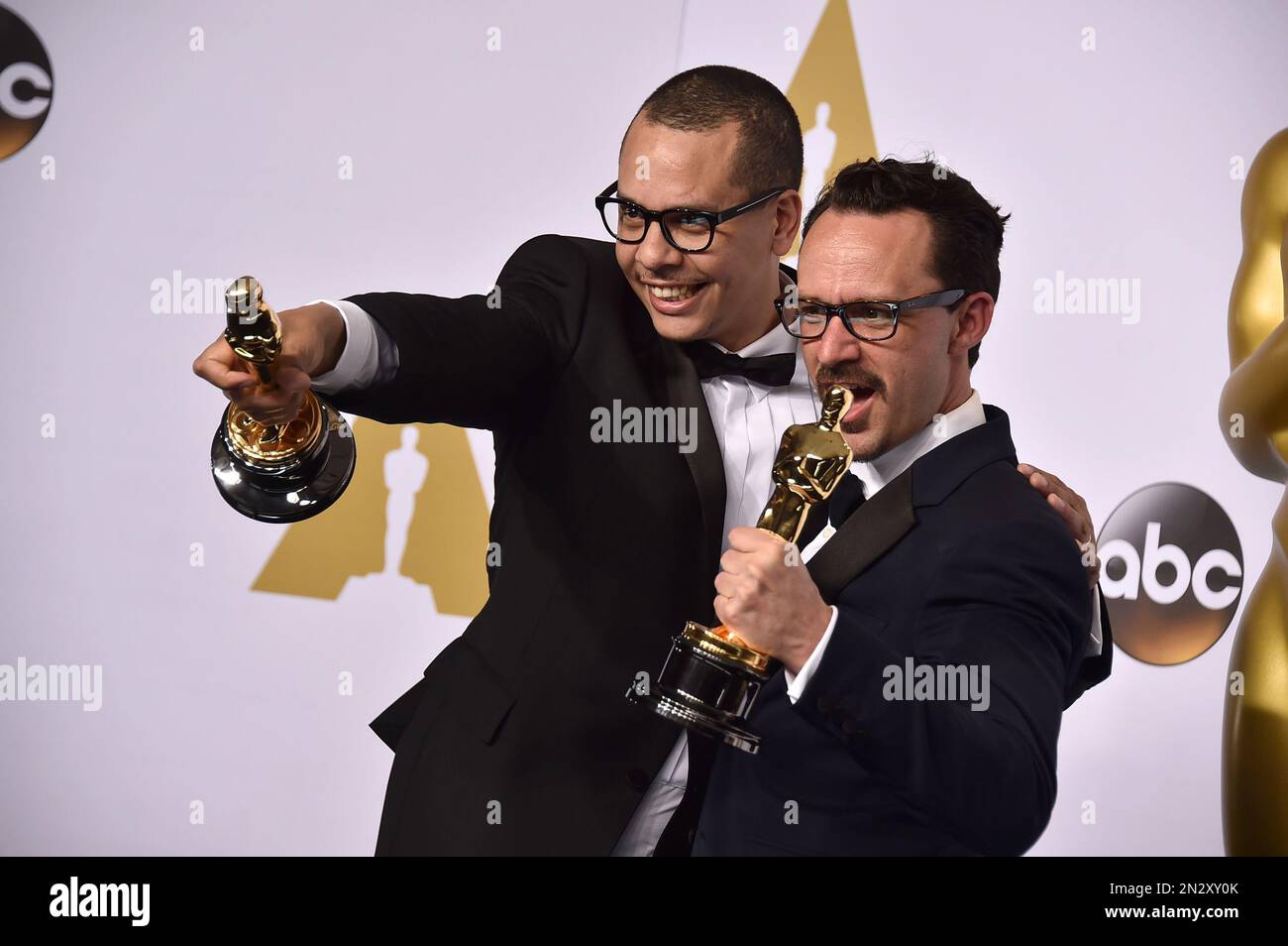 James Lucas, left, and Mat Kirkby pose in the press room with the award