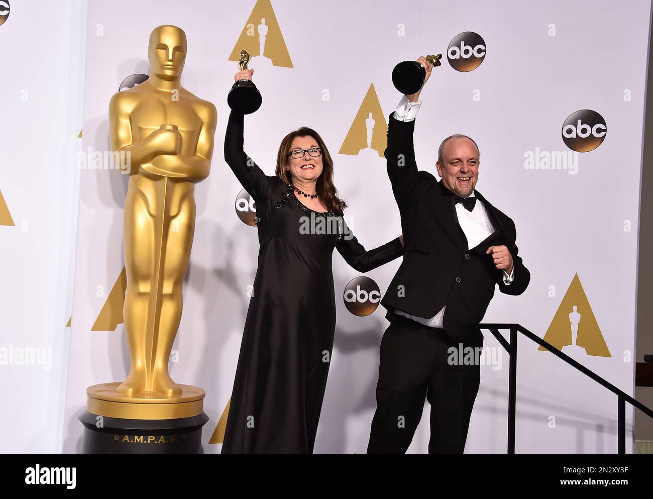 Frances Hannon, left, and Mark Coulier pose in the press room with the