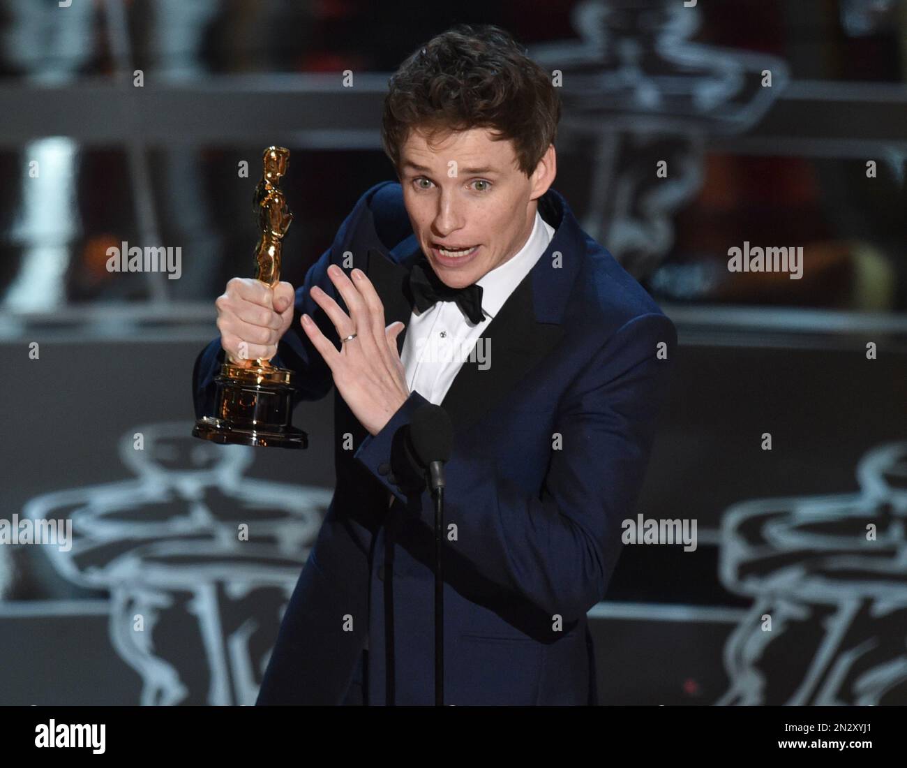Eddie Redmayne accepts the award for best actor in a leading role for ...