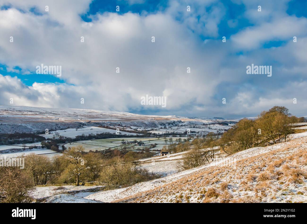 A light covering of snow, sunshine, shadows and a super winter sky in this view towards Holwick, Teesdale Stock Photo