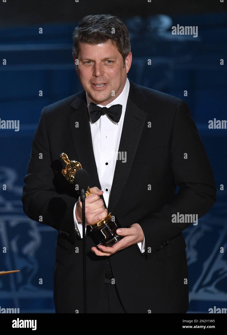 Adam Stockhausen accepts the award for best production design for “The(00)