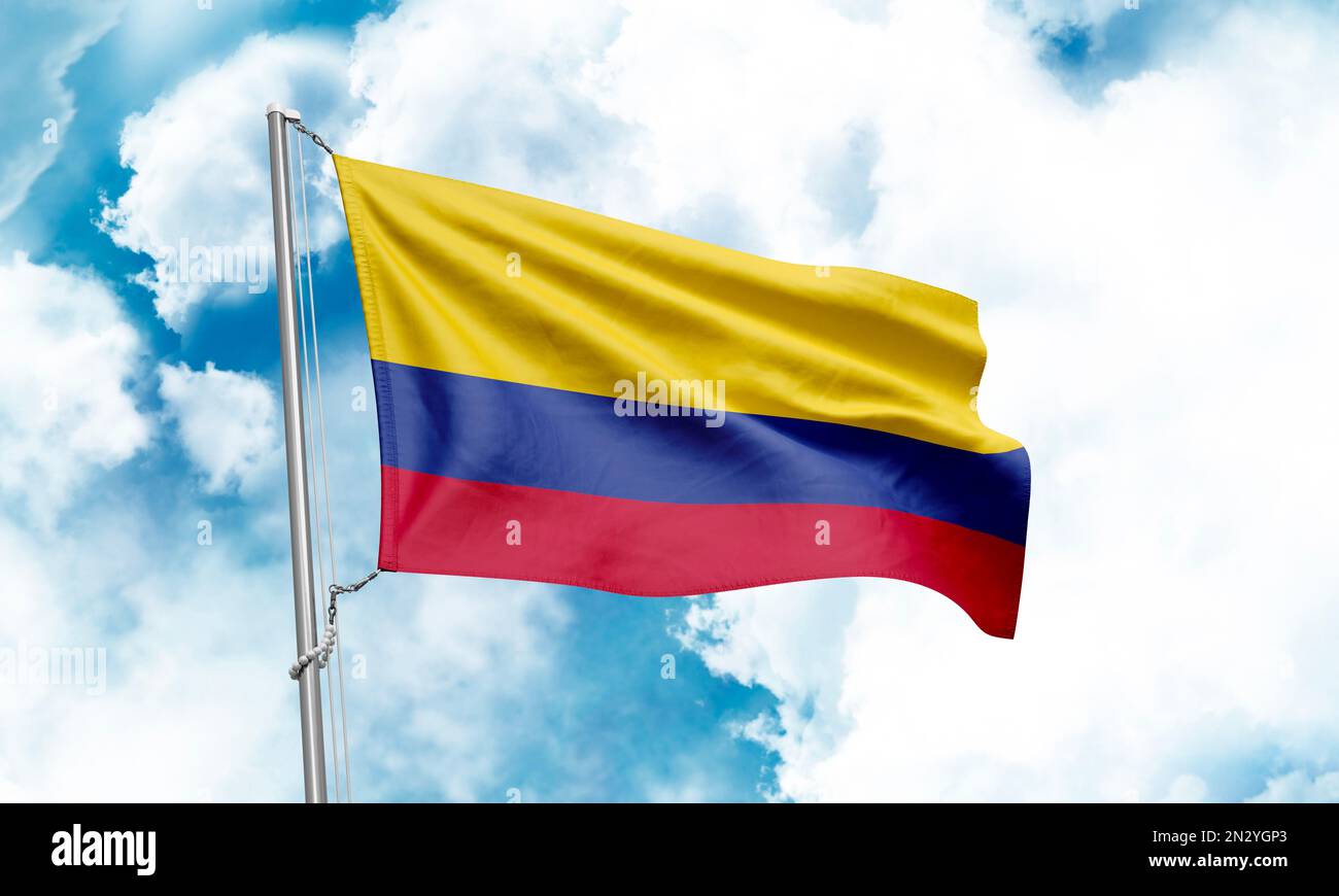 Colombia flag waving on sky background. 3D Rendering Stock Photo