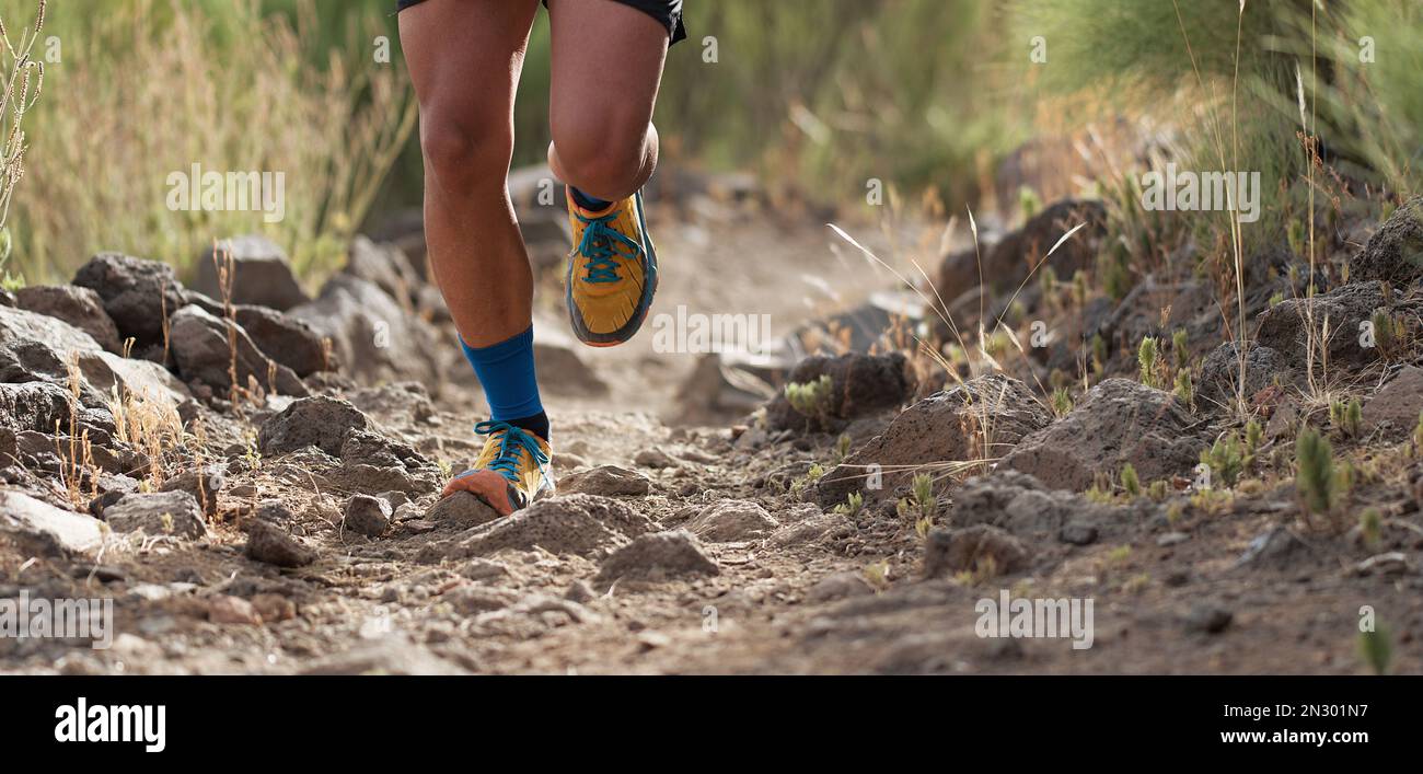 Athletic man running on mountain hi-res stock photography and images ...