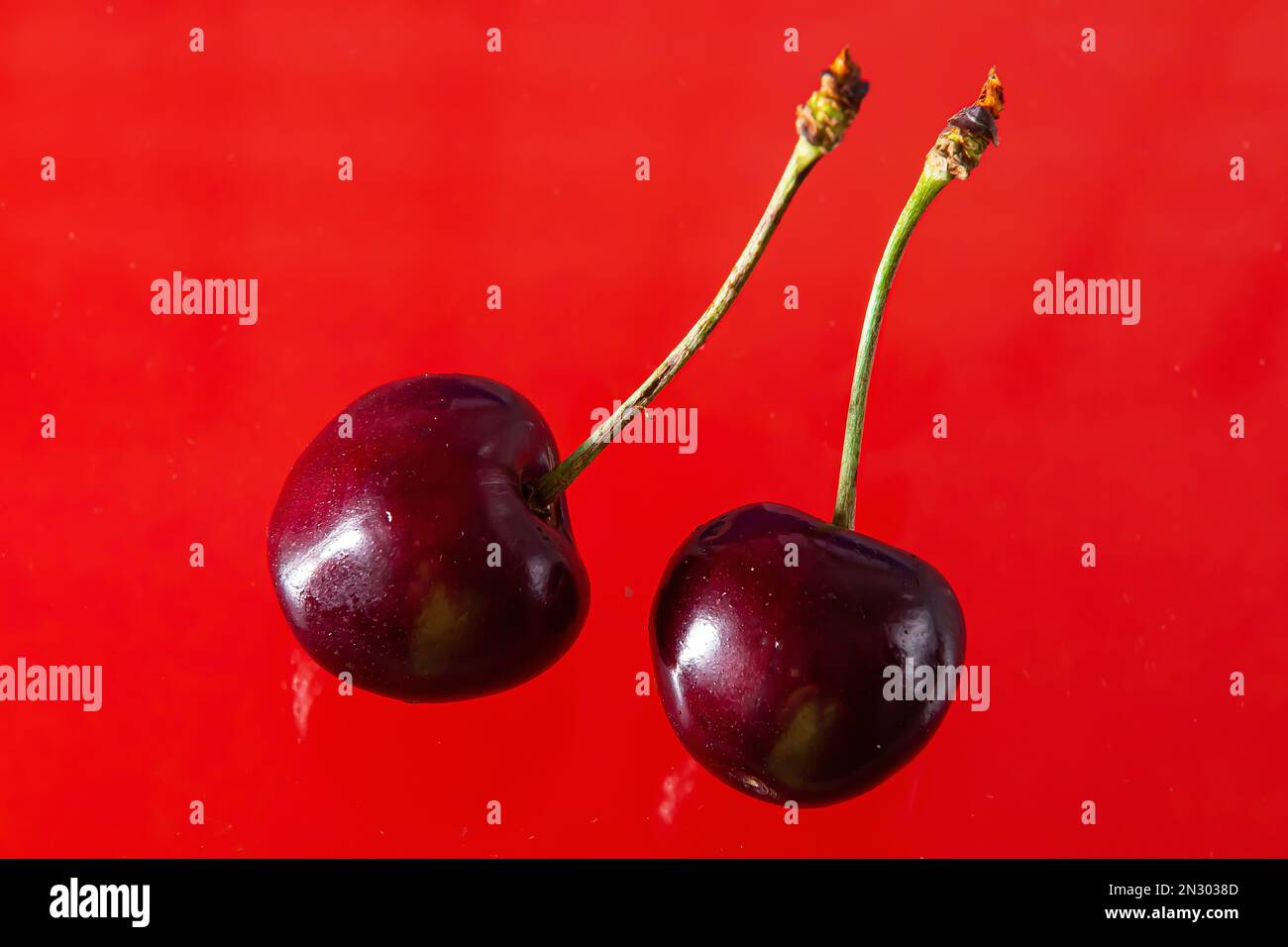 Ripe cherries on a solid background, healthy vegetarian food. Beautiful ...