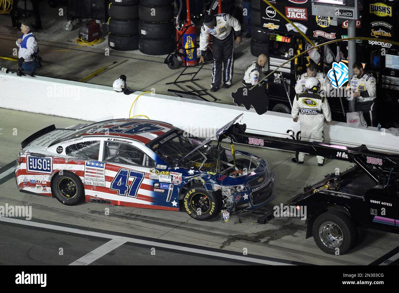 Aj Allmendinger 47 Is Towed Down Pit Road After Hitting The Wall Along The Front Stretch 0112