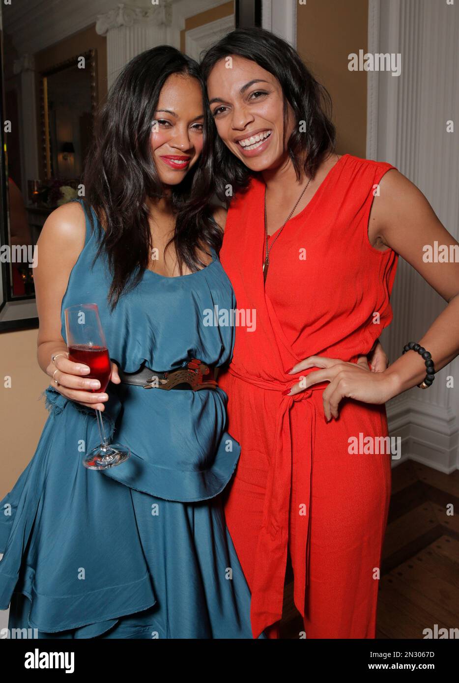 IMAGE DISTRIBUTED FOR ALFRE WOODARD - Zoe Saldana and Rosario Dawson attend  Alfre Woodard's 2015 Oscar's Sistahs Soirée sponsored by White Diamond  Lustre, Elizabeth Taylor and Piper-Heidseick. Event Design by AOO Events, image size:934x1390