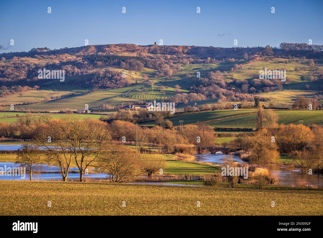 Bredon Hill Tower and Eckington Bridge over the River Avon in the