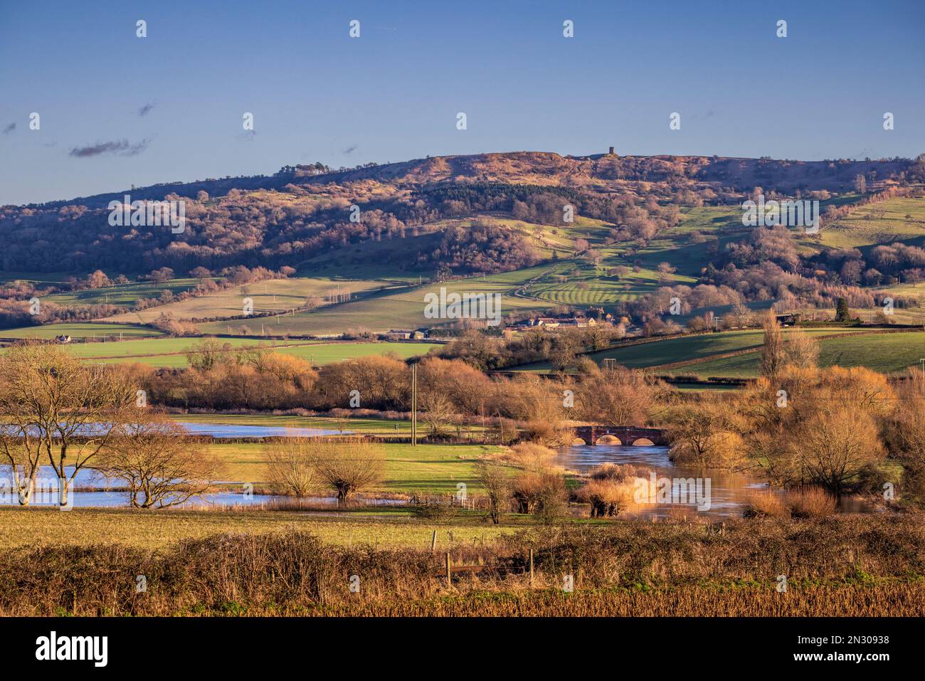 Bredon Hill Tower and Eckington Bridge over the River Avon in the